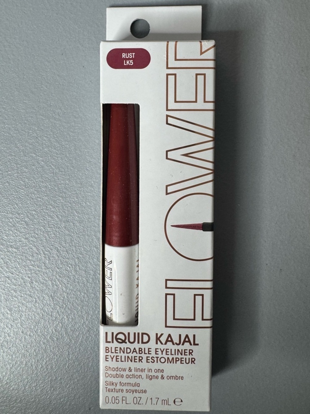 Flower Liquid Kajal Blendable Eyeliner in Rust shadow and eyeliner in one maroon